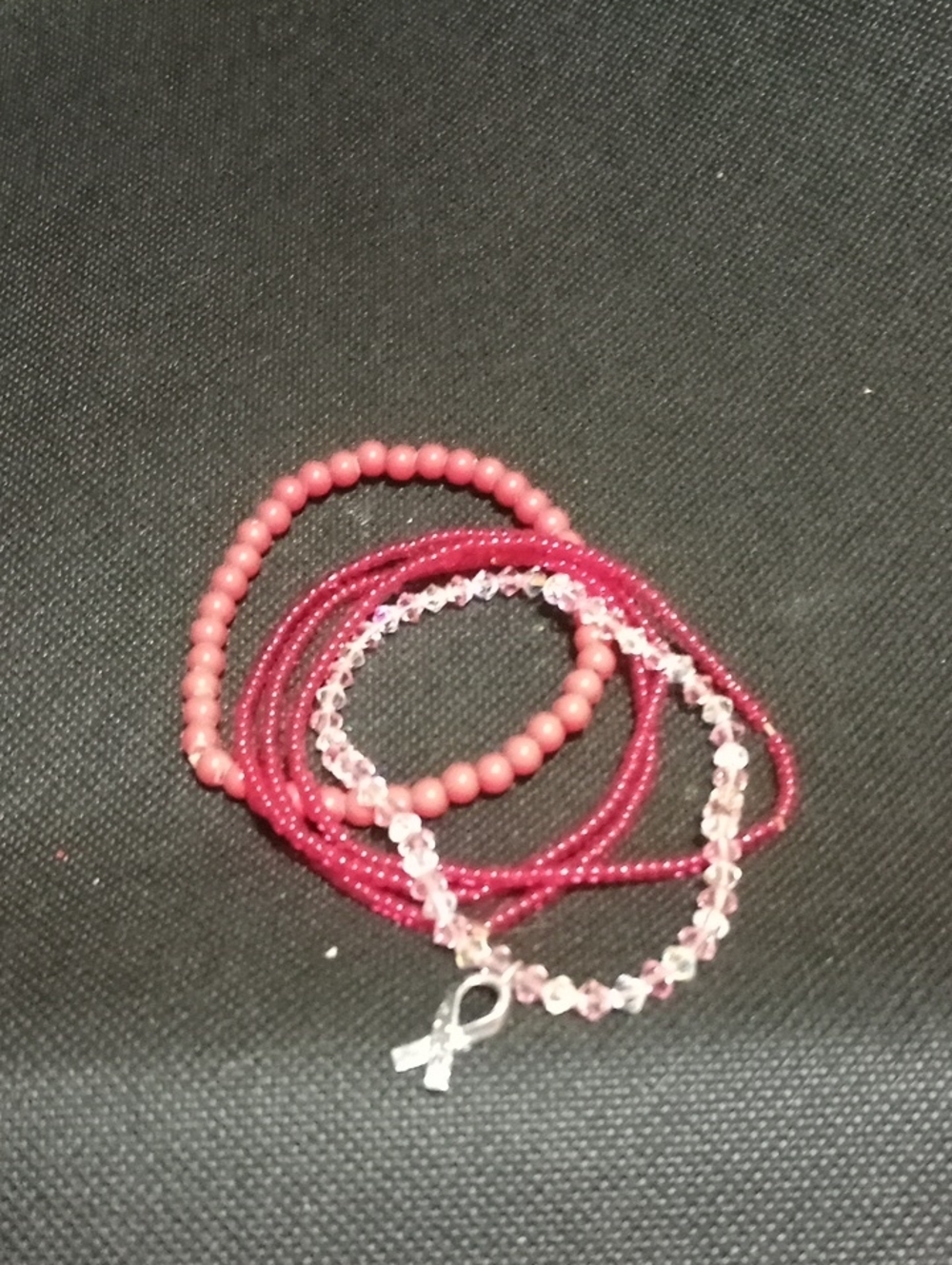 Pink And Red Beaded Ribbon Charm Bracelet Stack